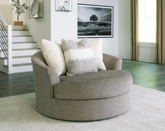 Tampa Furniture Outlet Lutz - Ashley Furniture - Creswell Living Room - Oversized Swivel Accent Chair / Stone - 1530521