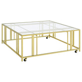 Tampa Furniture Outlet - Coaster - Adri Square Glass Top Coffee Table with Casters Matte Brass - 710188