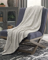 Tampa Furniture Outlet Lutz - Ashley Furniture - Leonita Throw - Throw / Black/White - A1000769T