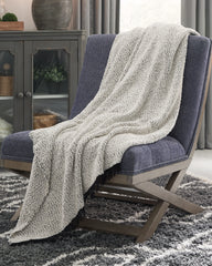 Tampa Furniture Outlet Lutz - Ashley Furniture - Leonita Throw - Throw / Black/White - A1000769T