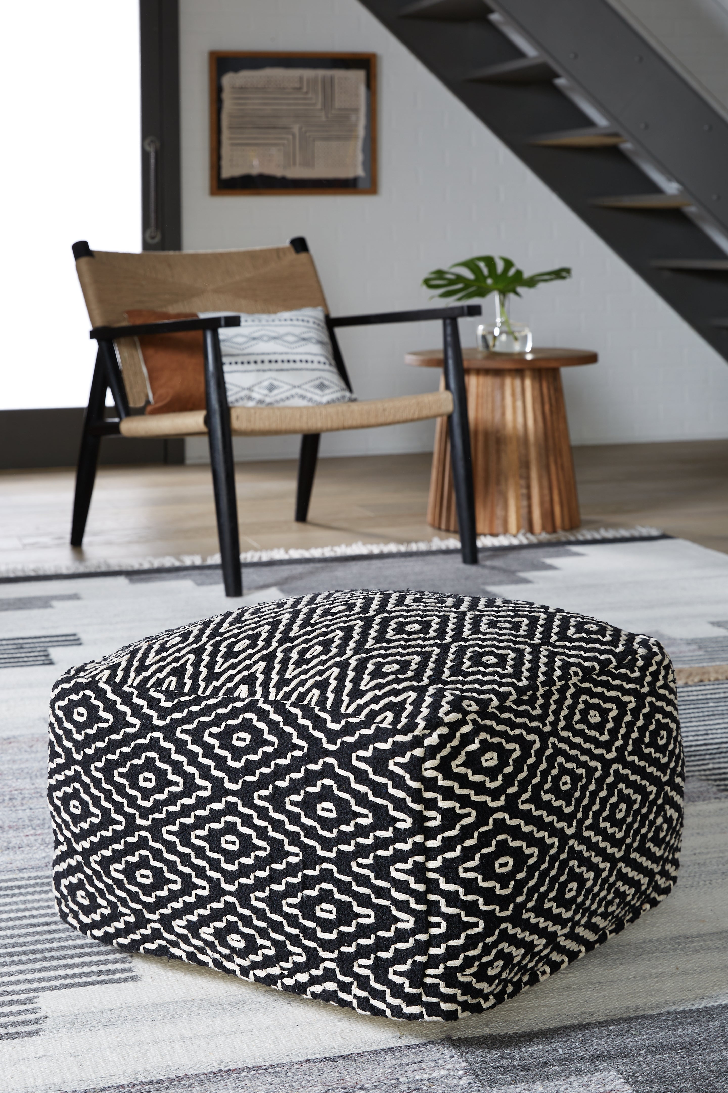 Tampa Furniture Outlet Lutz - Ashley Furniture - Jasett Pouf - Pouf / Black/Ivory - A1001058