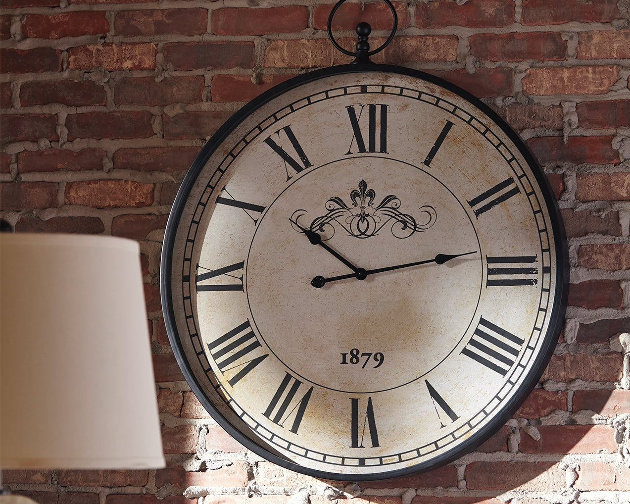 Tampa Furniture Outlet Lutz - Ashley Furniture - Augustina Wall Decor - Wall Clock / Antique Black - A8010110