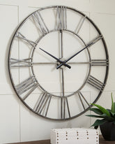 Tampa Furniture Outlet Lutz - Ashley Furniture - Paquita Wall Decor - Wall Clock / Antique Silver - A8010237