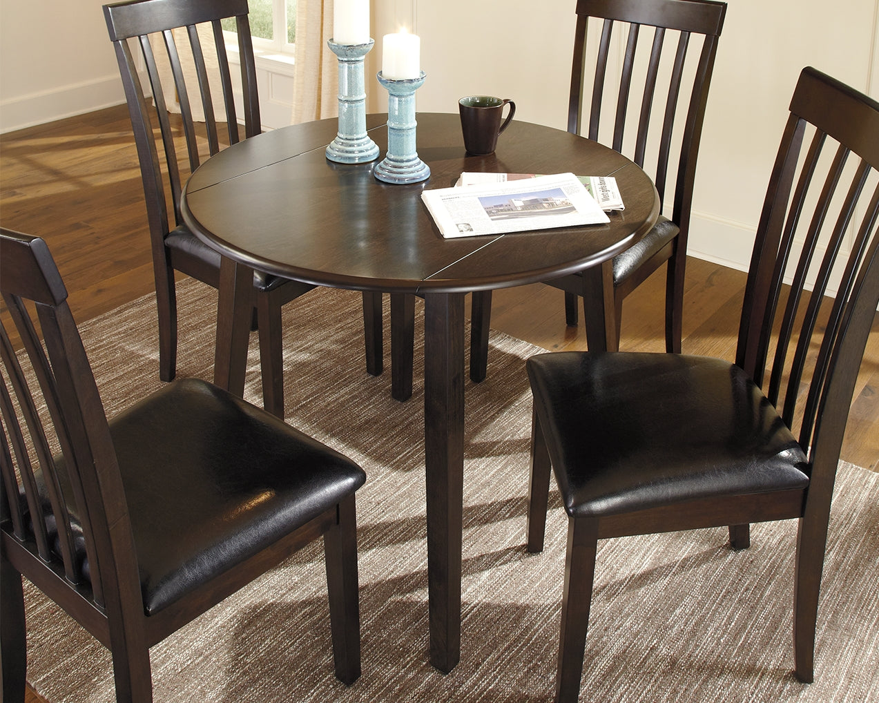 Tampa Furniture Outlet Lutz - Ashley Furniture - Hammis Dining Room - Round DRM Drop Leaf Table / Dark Brown - D310-15