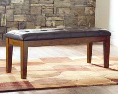 Tampa Furniture Outlet Lutz - Ashley Furniture - Ralene Dining Bench - Large UPH Dining Room Bench / Medium Brown / 50"W x 16"D x 19"H - D594-00