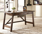 Tampa Furniture Outlet Lutz - Ashley Furniture - Baldridge Office Desk - Home Office Large Leg Desk / Rustic Brown - H675-44