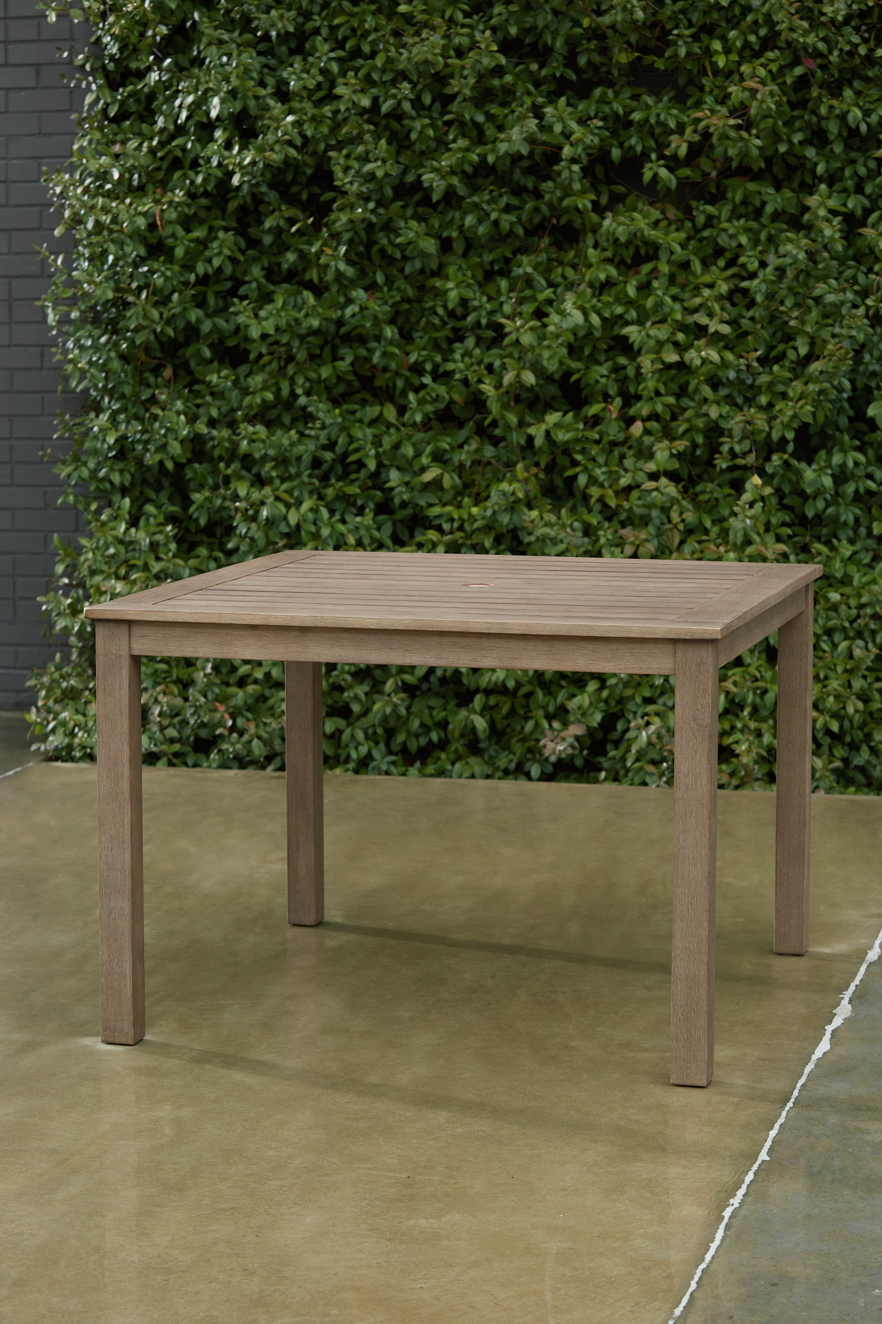 Tampa Furniture Outlet Lutz - Ashley Furniture - Aria Plains Outdoor - Square Dining Table w/UMB OPT / Brown - P359-615