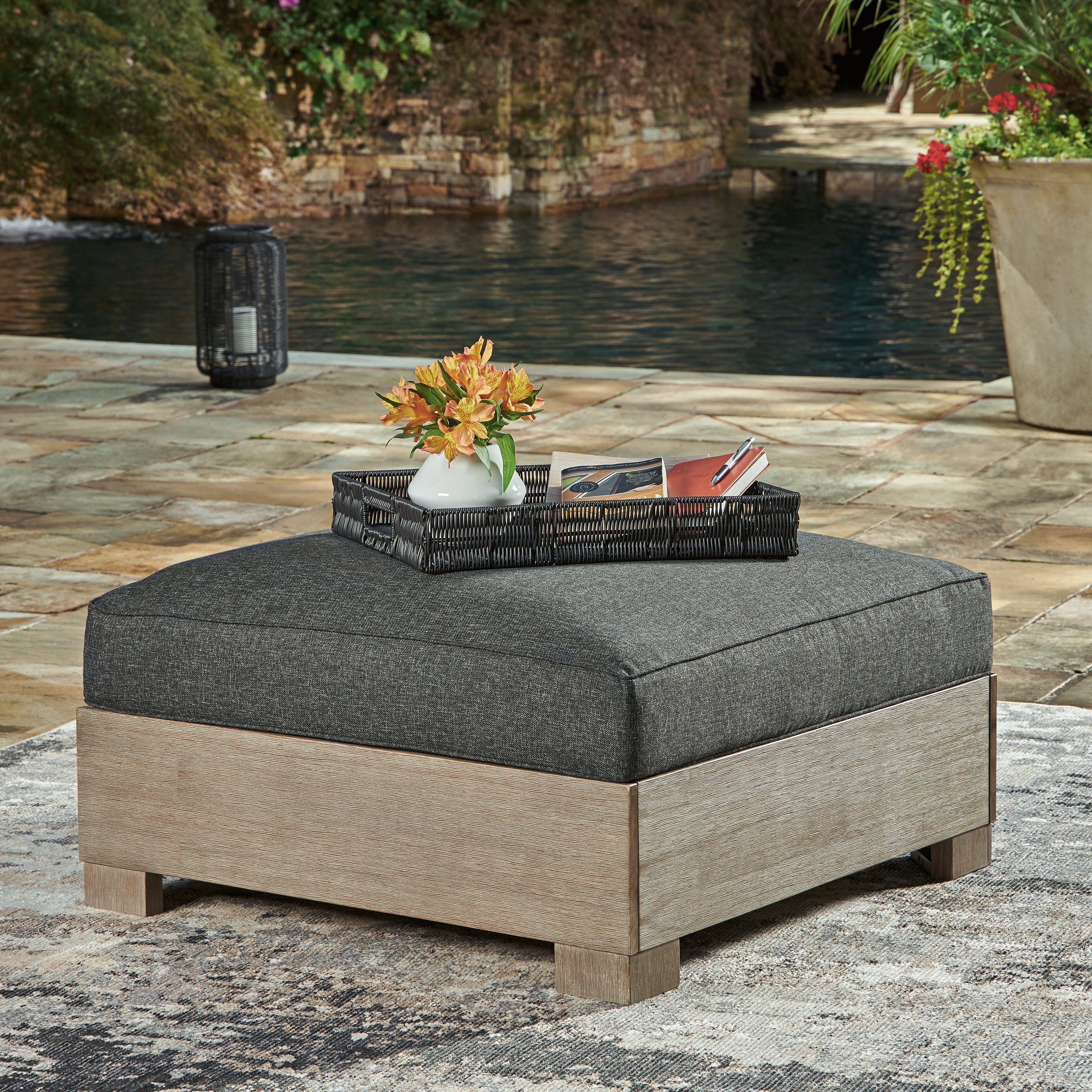 Tampa Furniture Outlet Lutz - Ashley Furniture - Citrine Park Outdoor - Ottoman with Cushion / Brown/Charcoal - P660-814