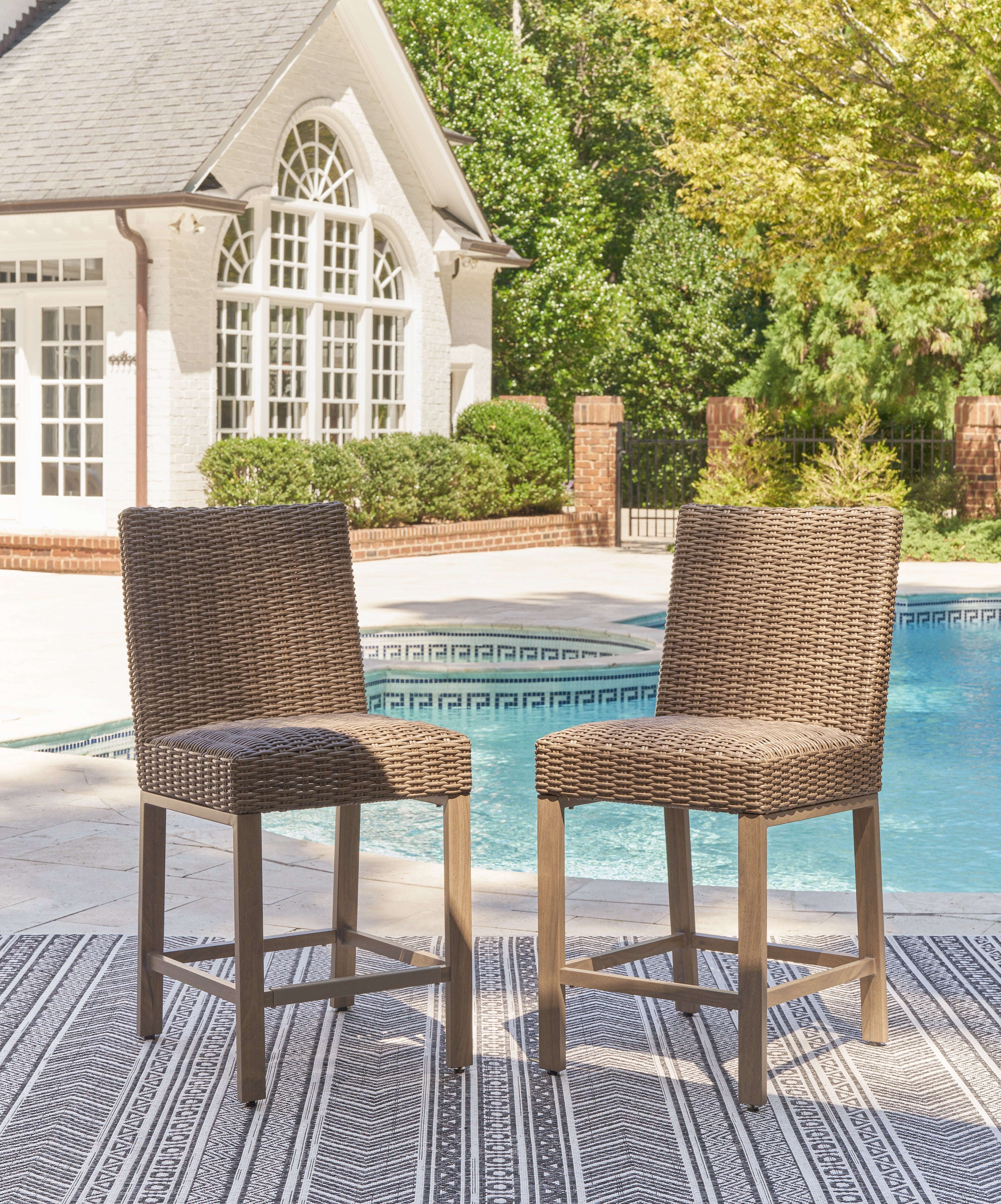 Tampa Furniture Outlet Lutz - Ashley Furniture - Walton Bridge Outdoor - Barstool (Set of 2) / Driftwood - P749-130