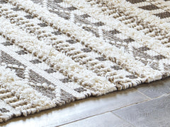 Tampa Furniture Outlet Lutz - Ashley Furniture - Karalee Rug - 5' x 7' Rug / Ivory/Brown - R404442