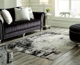 Tampa Furniture Outlet Lutz - Ashley Furniture - Zekeman Rug - 7'10" x 10' Rug / Black/Cream/Gray - R404921