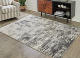 Tampa Furniture Outlet Lutz - Ashley Furniture - Gerdie Rug - 7'10" x 10' Rug / Cream/Gray - R404991