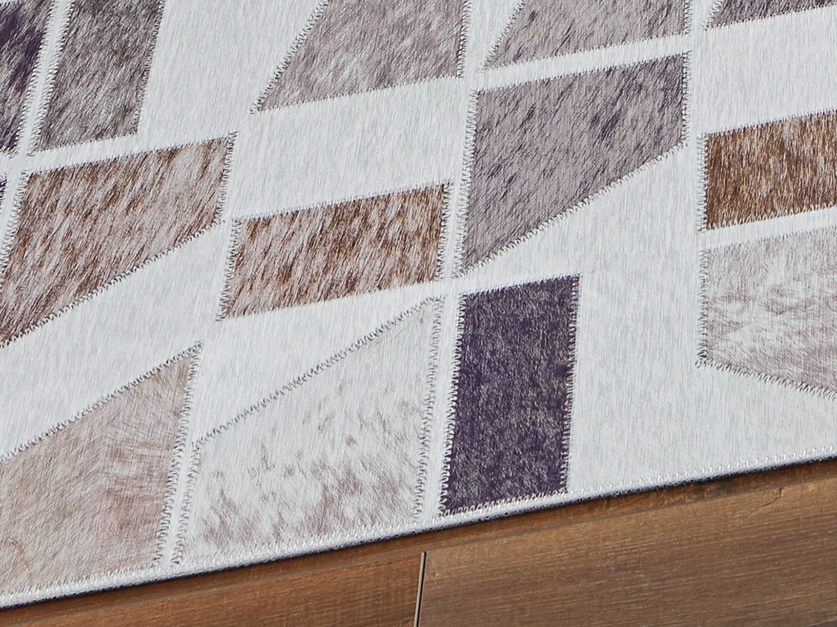 Tampa Furniture Outlet Lutz - Ashley Furniture - Jettner Rug - 7'10" x 10' Rug / Multi - R405781