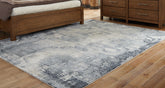 Tampa Furniture Outlet Lutz - Ashley Furniture - Langrich Rug - 7'10" x 10'6" Rug / Blue/Gray/Cream - R406131