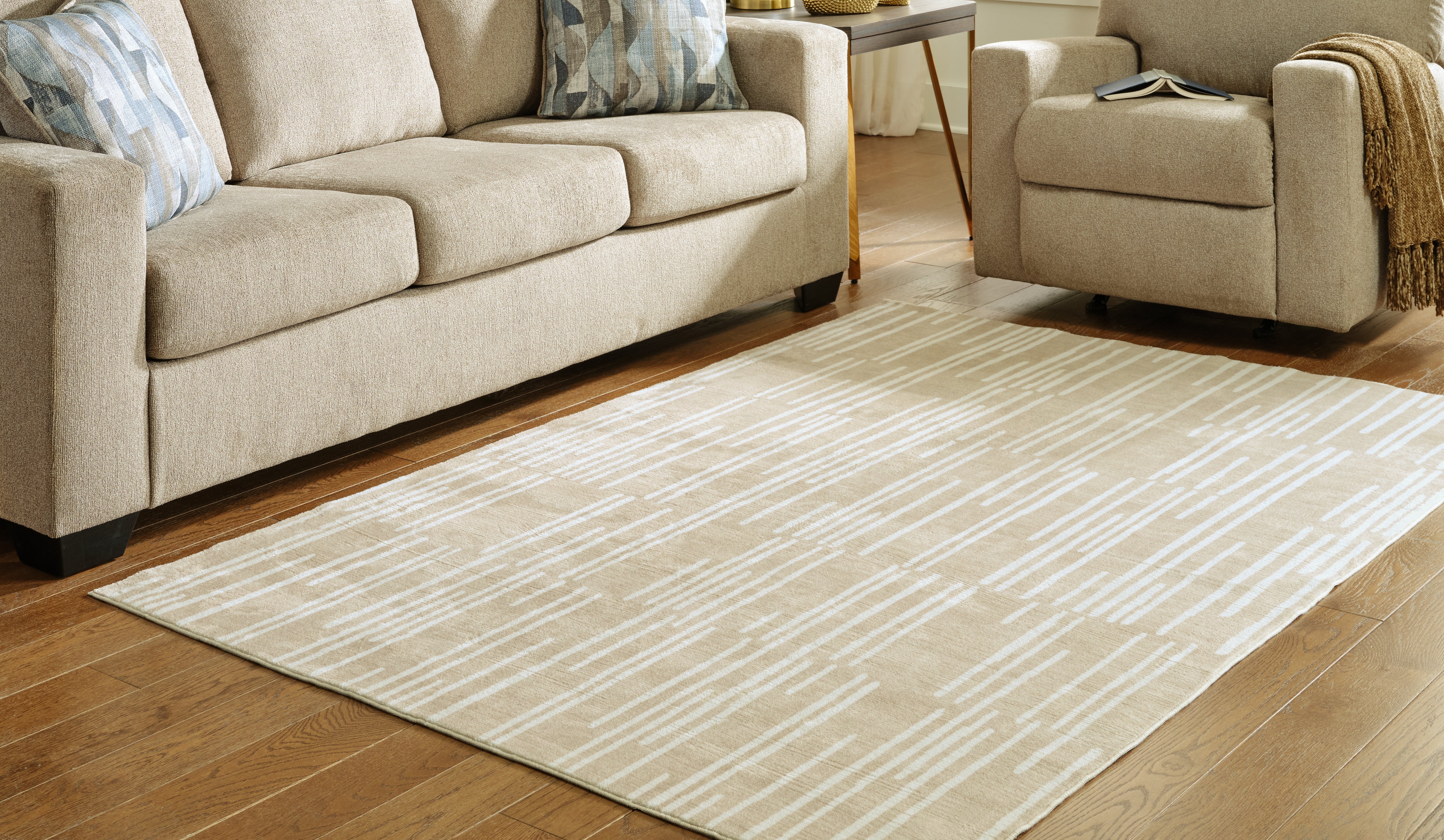 Tampa Furniture Outlet Lutz - Ashley Furniture - Ardenville Rug - 5' x 7'1" Washable Rug / Tan/Cream - R406212