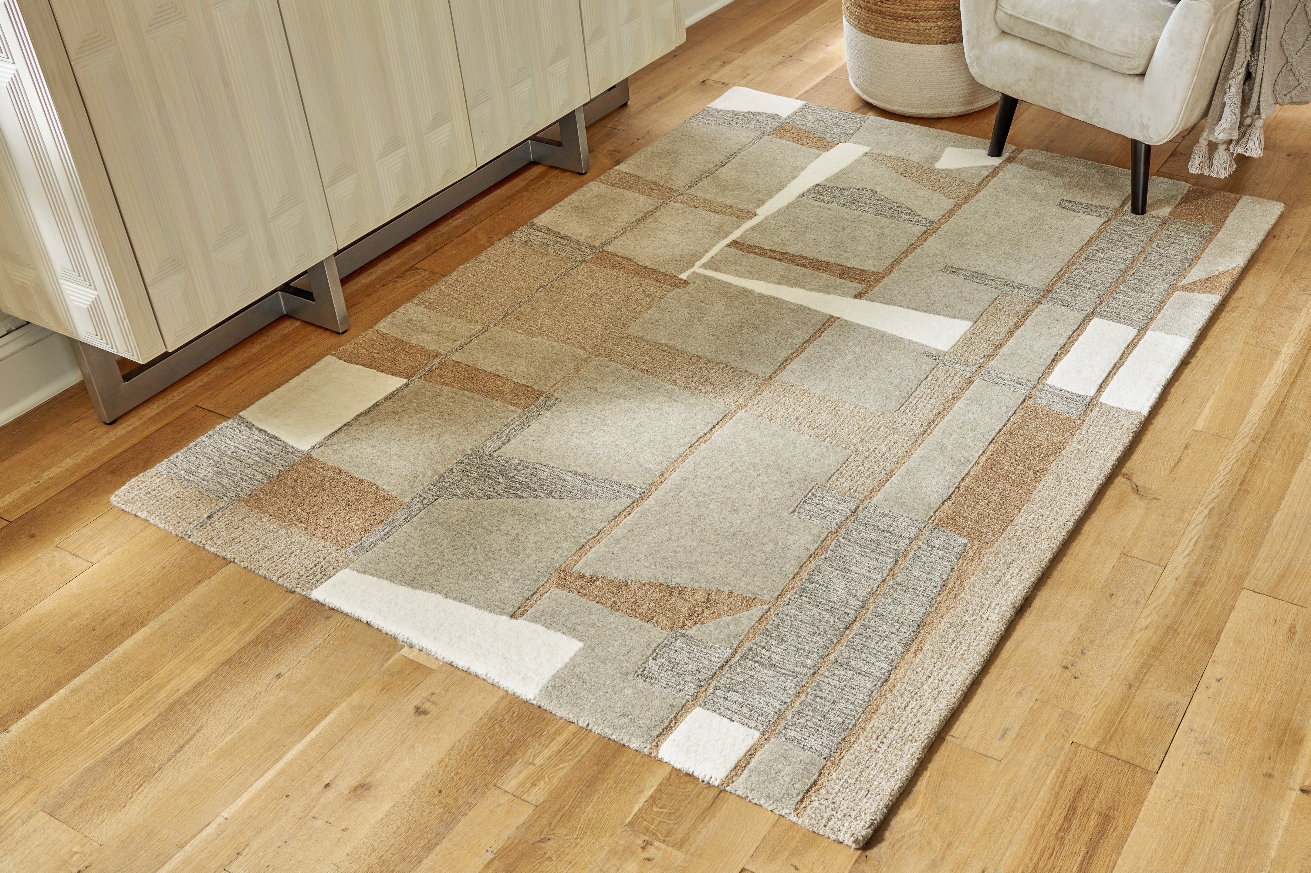 Tampa Furniture Outlet Lutz - Ashley Furniture - Abbotton Rug - 5' x 7' Rug / Taupe/Gray/Caramel - R406332