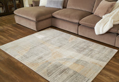 Tampa Furniture Outlet Lutz - Ashley Furniture - Truward Rug - 5' x 7' Rug / Linen/Gray/Caramel - R406472