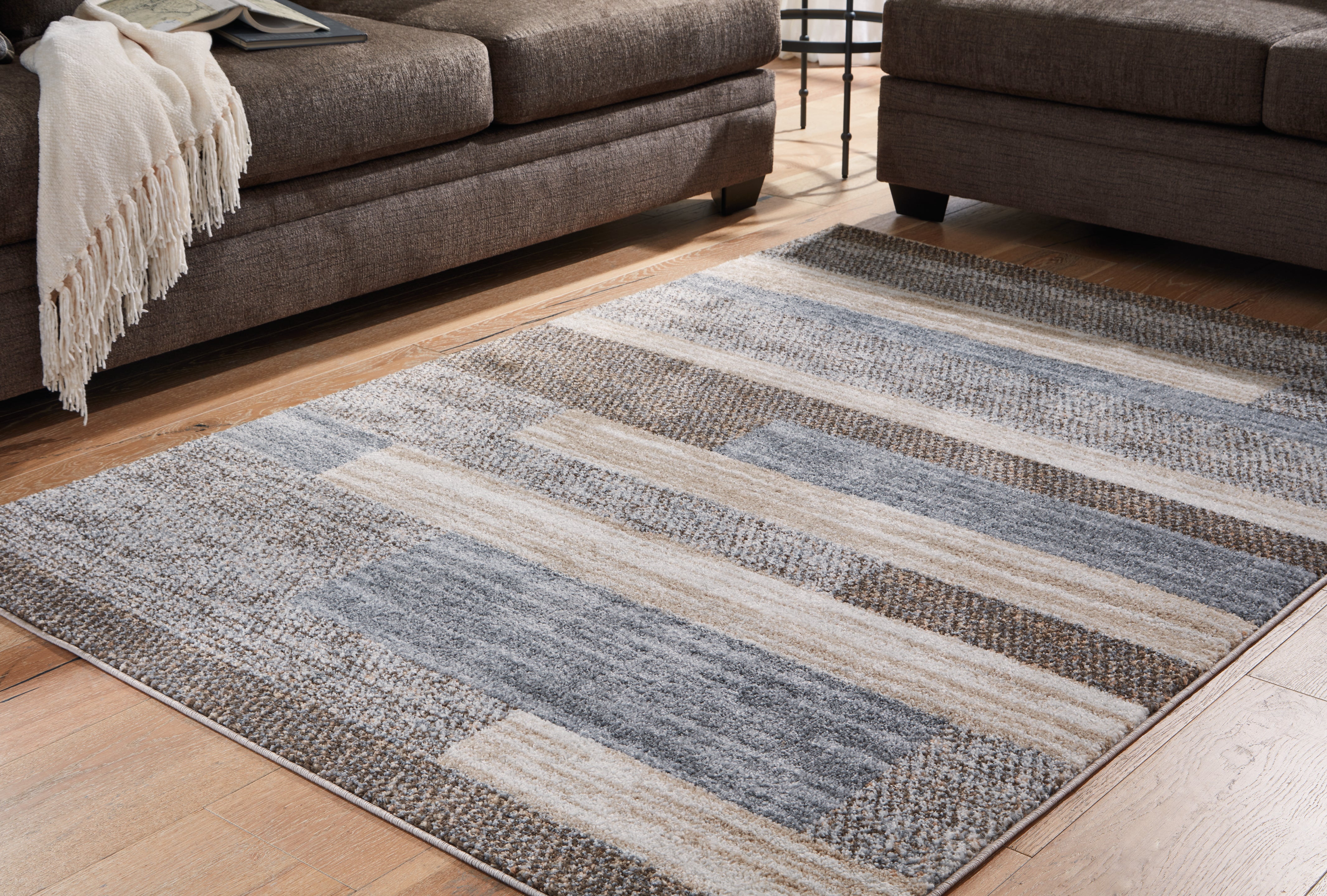 Tampa Furniture Outlet Lutz - Ashley Furniture - Sethburn Rug - 8' x 10' Rug / Cream/Brown/Gray - R406591