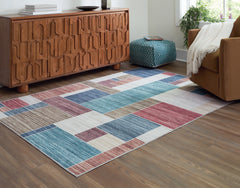 Tampa Furniture Outlet Lutz - Ashley Furniture - Numore Rug - 5'2" x 6'11" Washable Rug / Multi - R406662