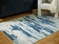 Tampa Furniture Outlet Lutz - Ashley Furniture - Vinlett Rug - 5' x 7' Washable Rug / Cream/Blue/Brown - R407042