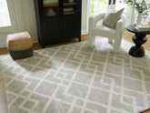 Tampa Furniture Outlet Lutz - Ashley Furniture - Unawick Rug - Large Rug / Gray/Ivory - R407331