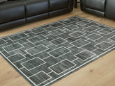 Tampa Furniture Outlet Lutz - Ashley Furniture - Elderland Rug - Washable 5' x 7' Area Rug / Black/Gray - R407402