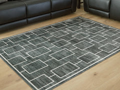 Tampa Furniture Outlet Lutz - Ashley Furniture - Elderland Rug - Washable 5' x 7' Area Rug / Black/Gray - R407402