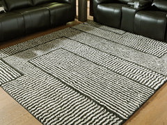 Tampa Furniture Outlet Lutz - Ashley Furniture - Kurtmen Rug - 7'10" x 9'10" Area Rug - R407591
