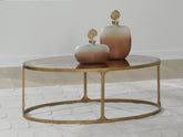 Tampa Furniture Outlet Lutz - Ashley Furniture - Korajane Coffee Table - Oval Cocktail Table / Antique Gold - T399-0