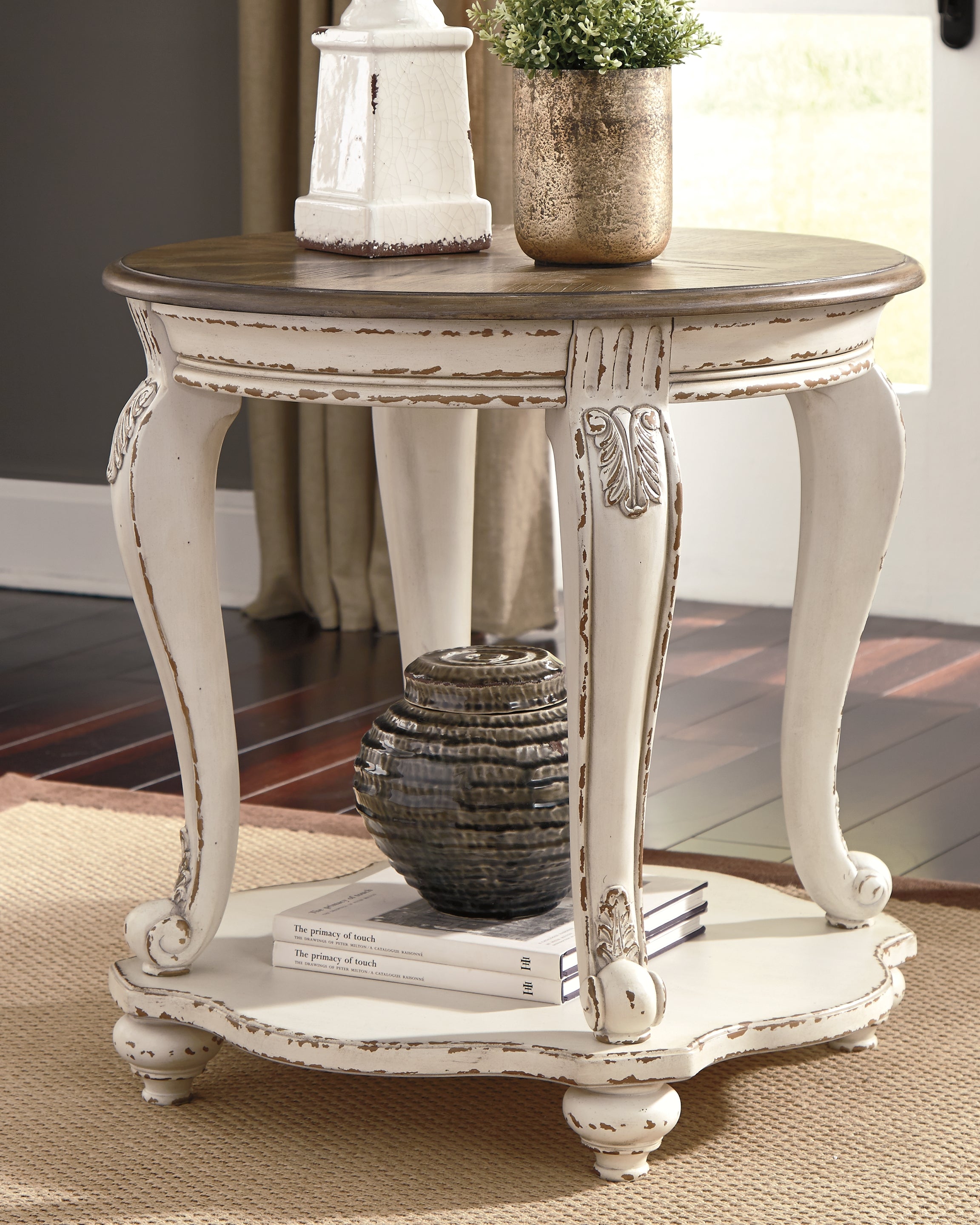 Tampa Furniture Outlet Lutz - Ashley Furniture - Realyn End Table - Round End Table / White/Brown - T743-6