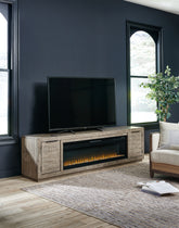 Tampa Furniture Outlet Lutz - Ashley Furniture - Krystanza TV Stand with Electric Fireplace - TV Stand with Electric Fireplace / Weathered Gray - W760W1