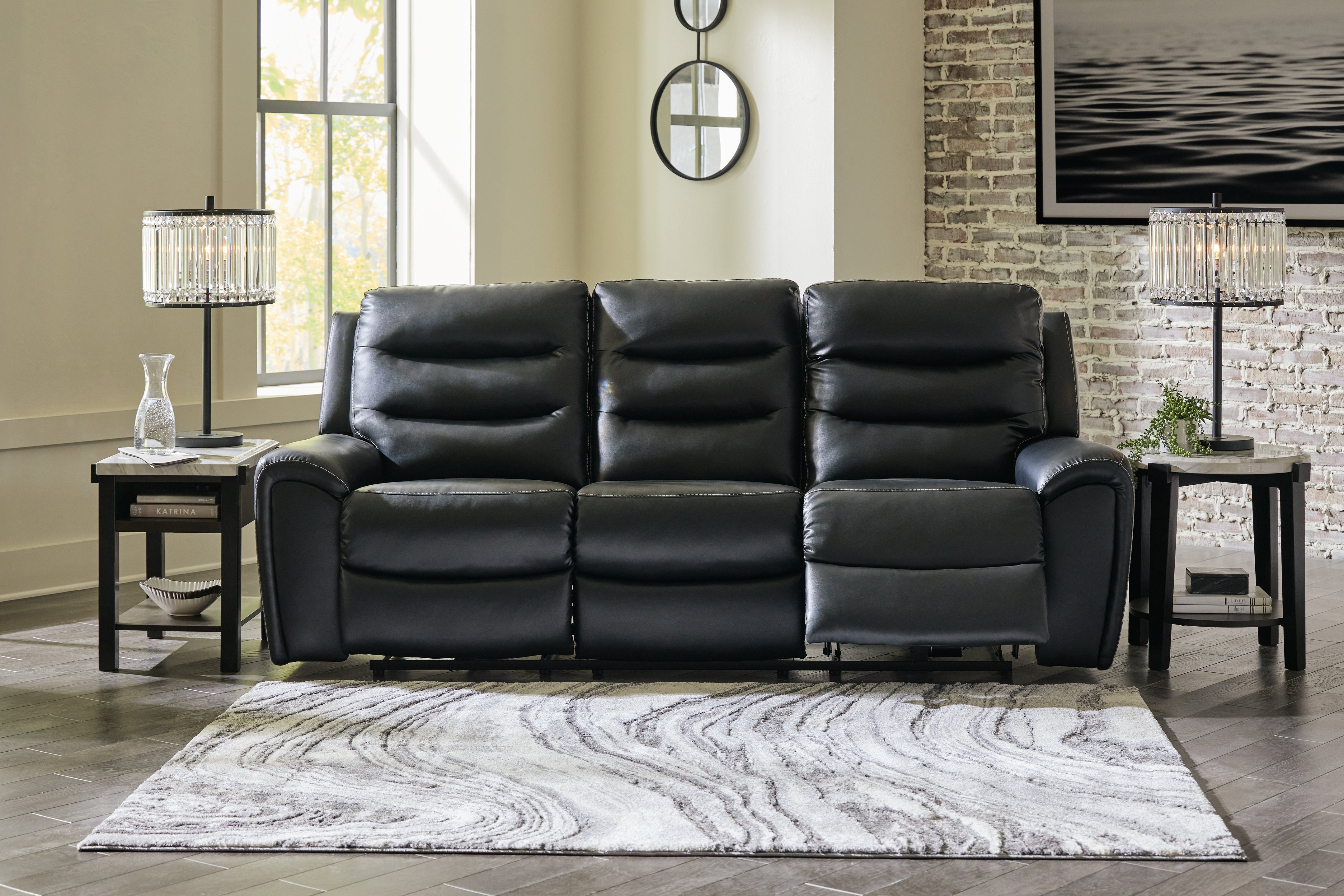 Tampa Furniture Outlet Lutz - Ashley Furniture - Warlin Living Room - PWR REC Sofa with ADJ Headrest / Black - 6110515