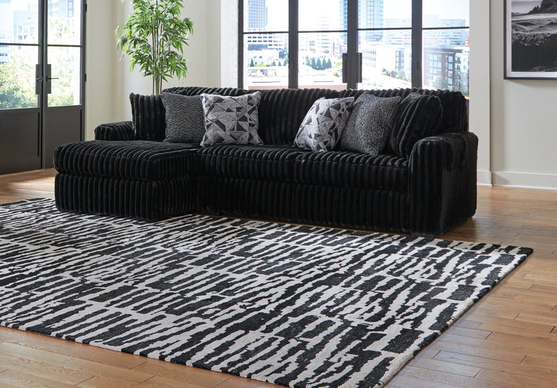Tampa Furniture Outlet Lutz - Ashley Furniture - Midnight-Madness Sectional - RAF 2-Piece Sectional Sofa with Chaise / Onyx - 98103S1