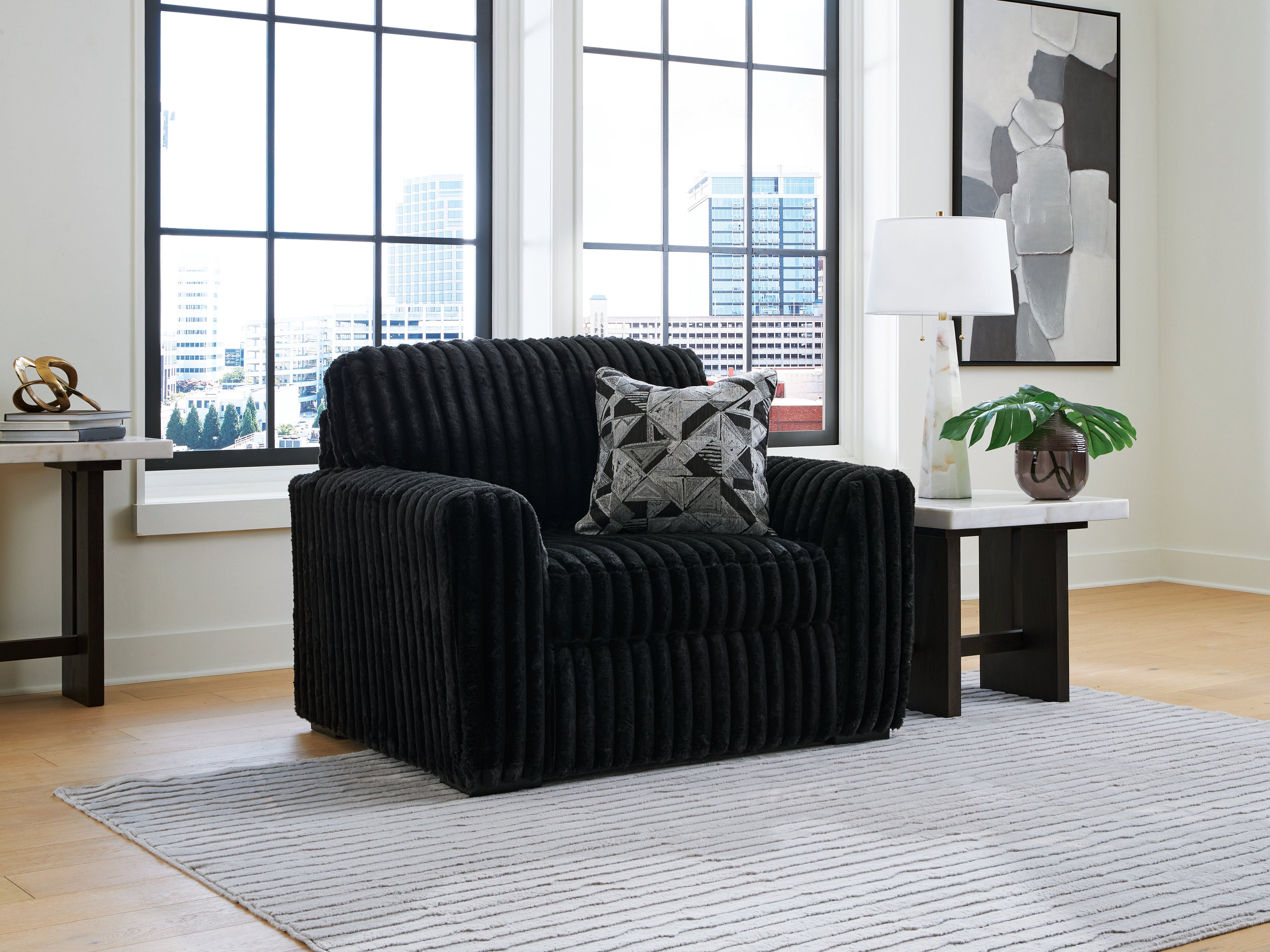 Tampa Furniture Outlet Lutz - Ashley Furniture - Midnight-Madness Living Room - Chair and a Half / Onyx - 9810323