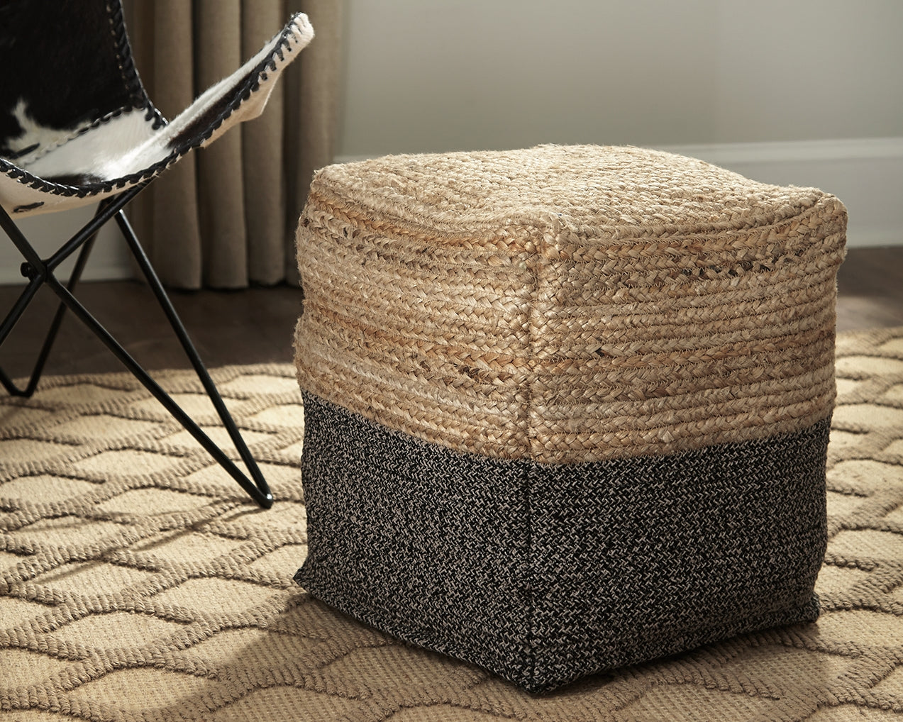 Tampa Furniture Outlet Lutz - Ashley Furniture - Sweed Valley Pouf - Pouf / Natural/Black - A1000422