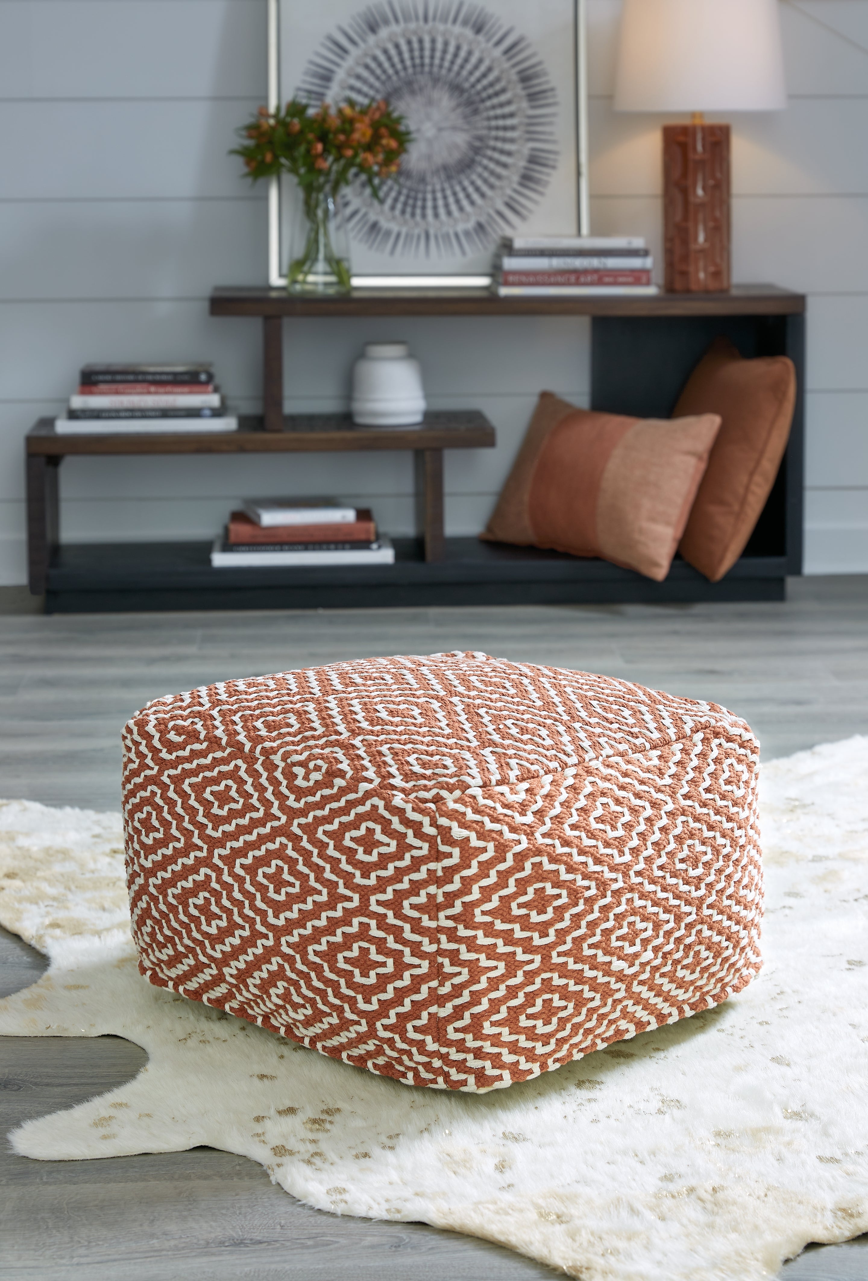 Tampa Furniture Outlet Lutz - Ashley Furniture - Brynnsen Pouf - Pouf / Rust/Ivory - A1001056