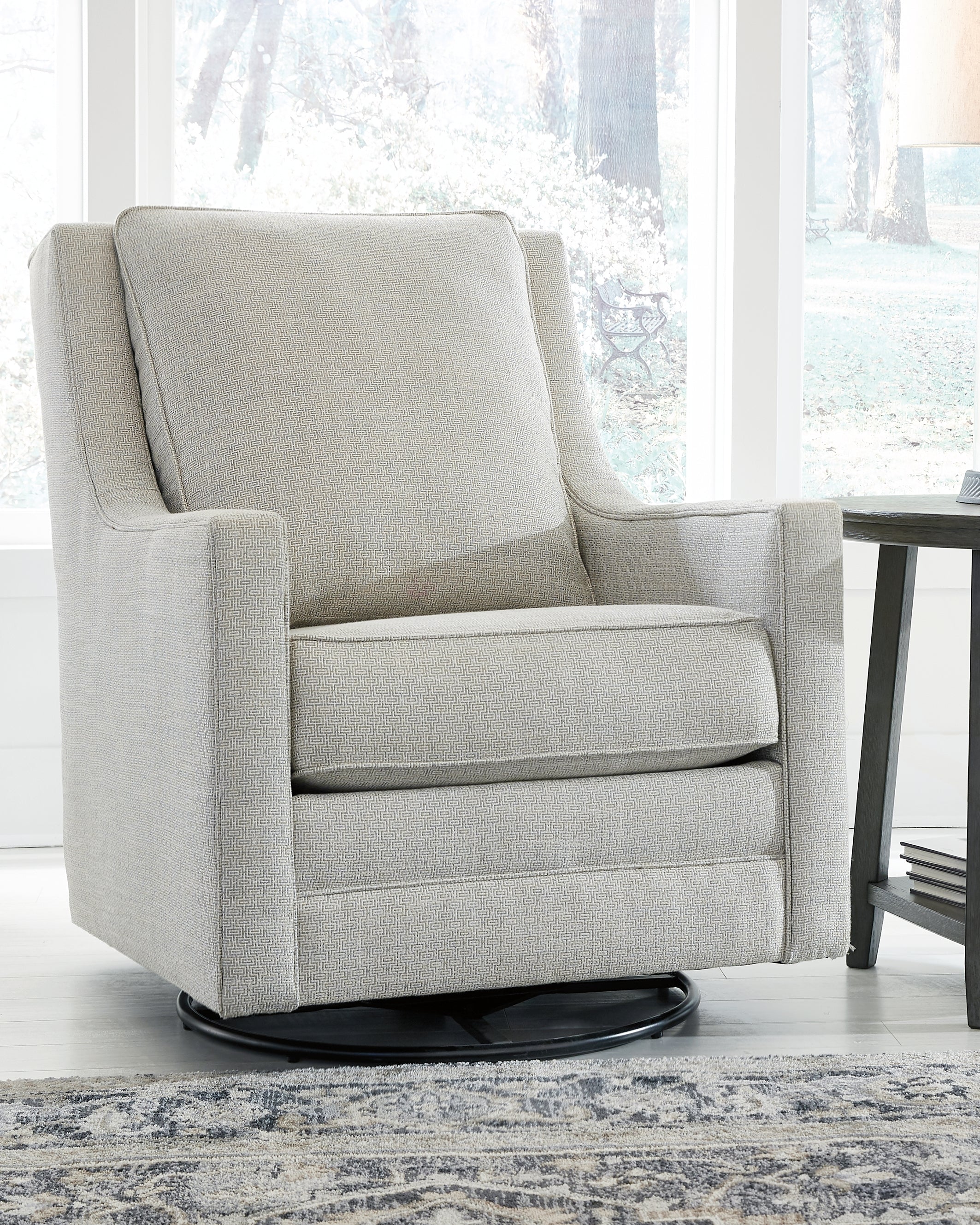 Tampa Furniture Outlet Lutz - Ashley Furniture - Kambria Swivel Glider Accent Chair - Swivel Glider Accent Chair / Frost - A3000206