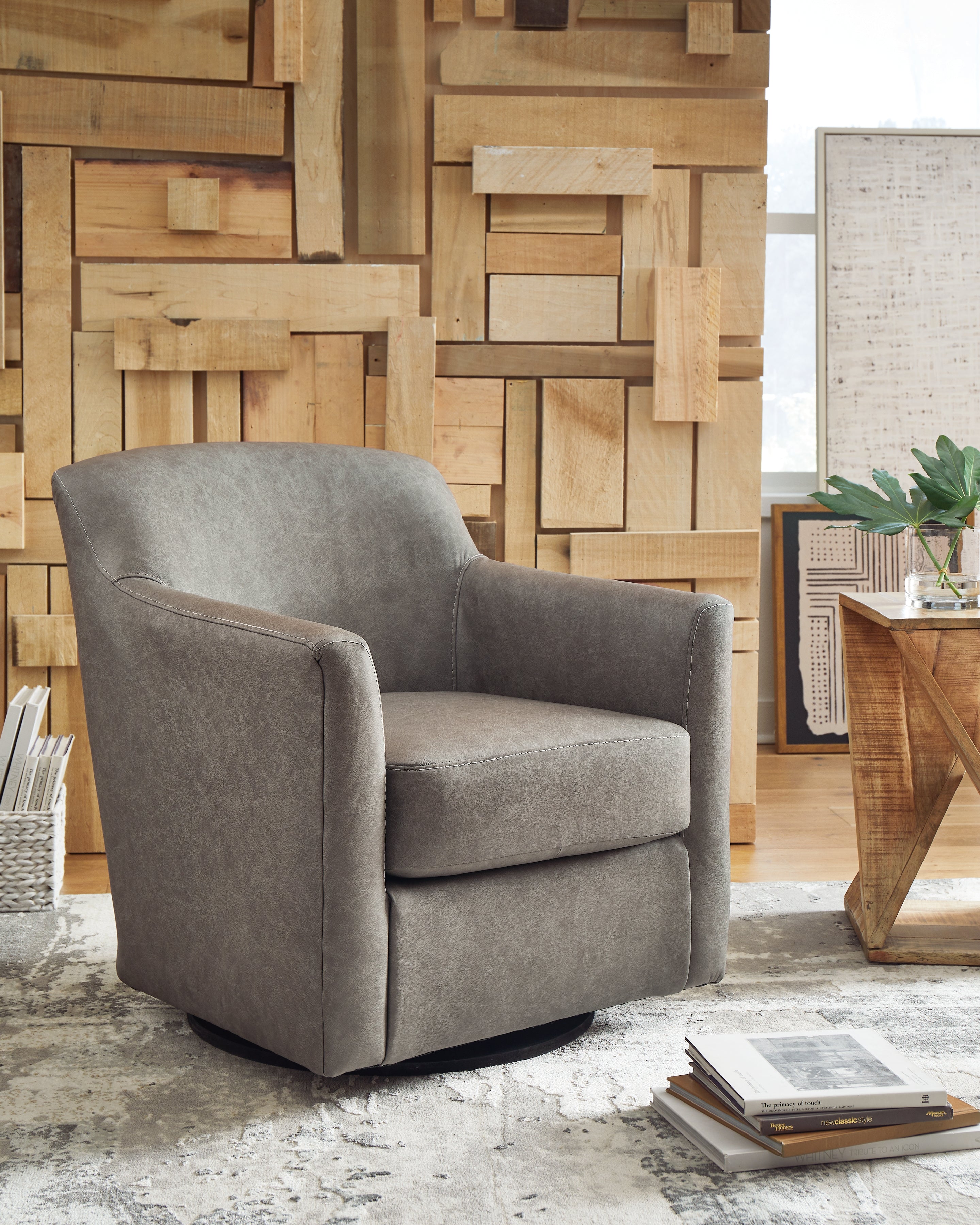 Tampa Furniture Outlet Lutz - Ashley Furniture - Bradney Swivel Accent Chair - Swivel Accent Chair / Fossil - A3000324