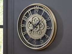 Tampa Furniture Outlet Lutz - Ashley Furniture - Gilover Wall Decor - Wall Clock / Champagne Finish - A8010386