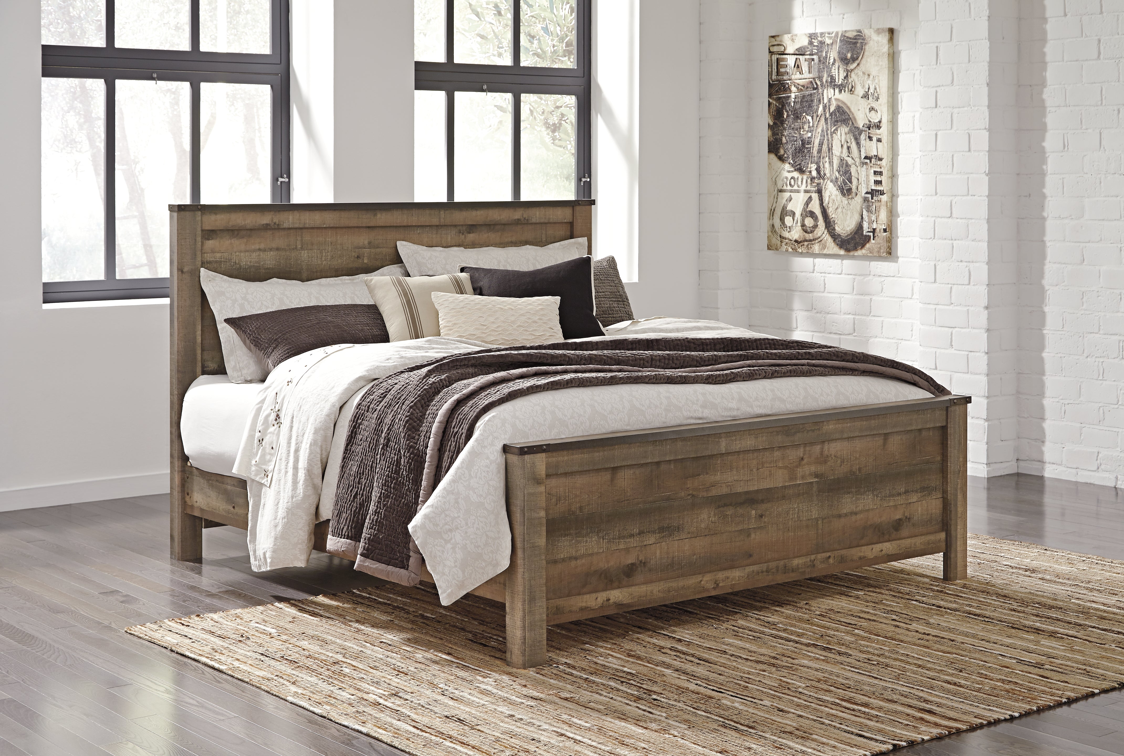 Tampa Furniture Outlet Lutz - Ashley Furniture - Trinell Bedroom - King Panel Bed / Brown - B446B23