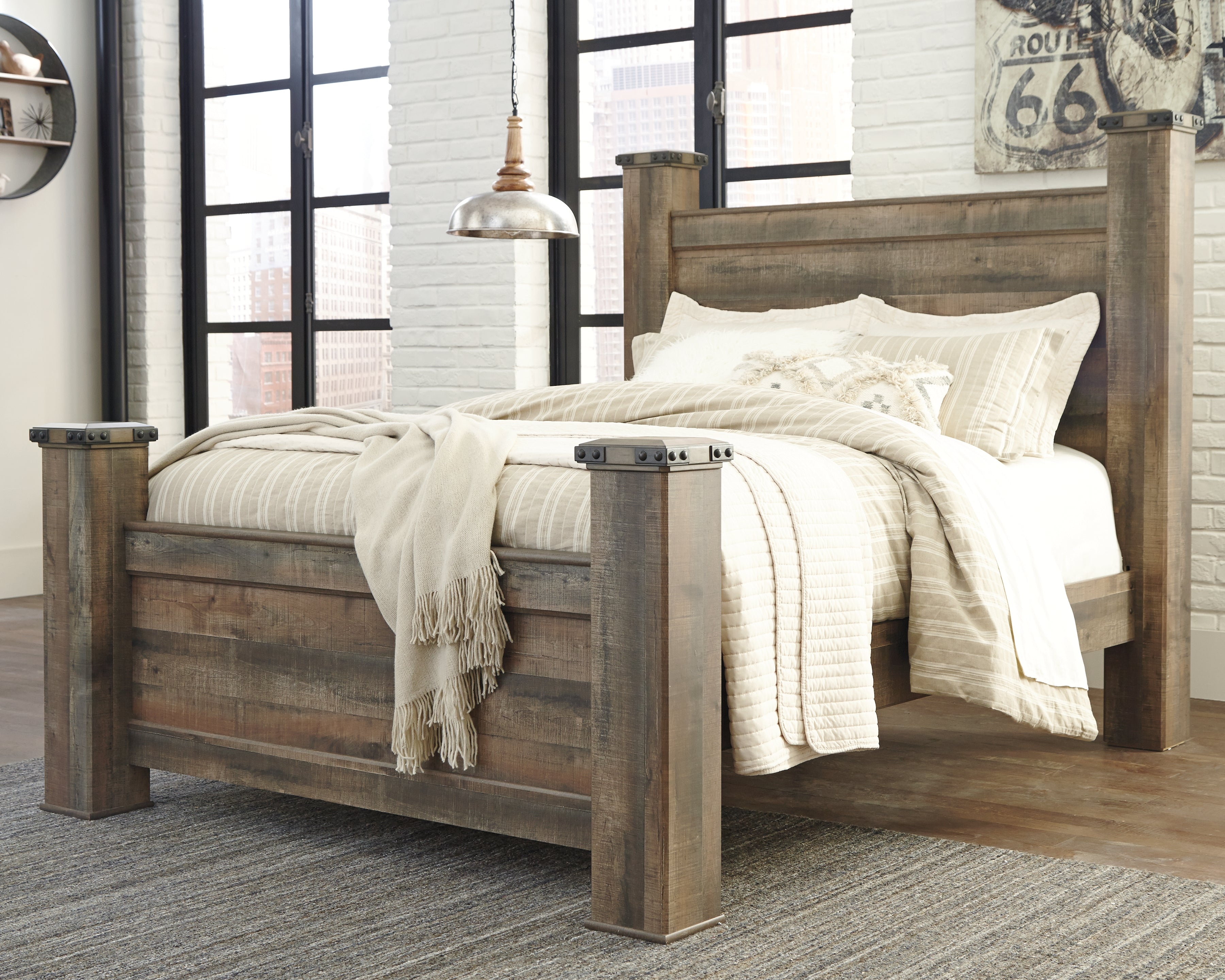 Tampa Furniture Outlet Lutz - Ashley Furniture - Trinell Bedroom - Queen Poster Bed / Brown - B446B40