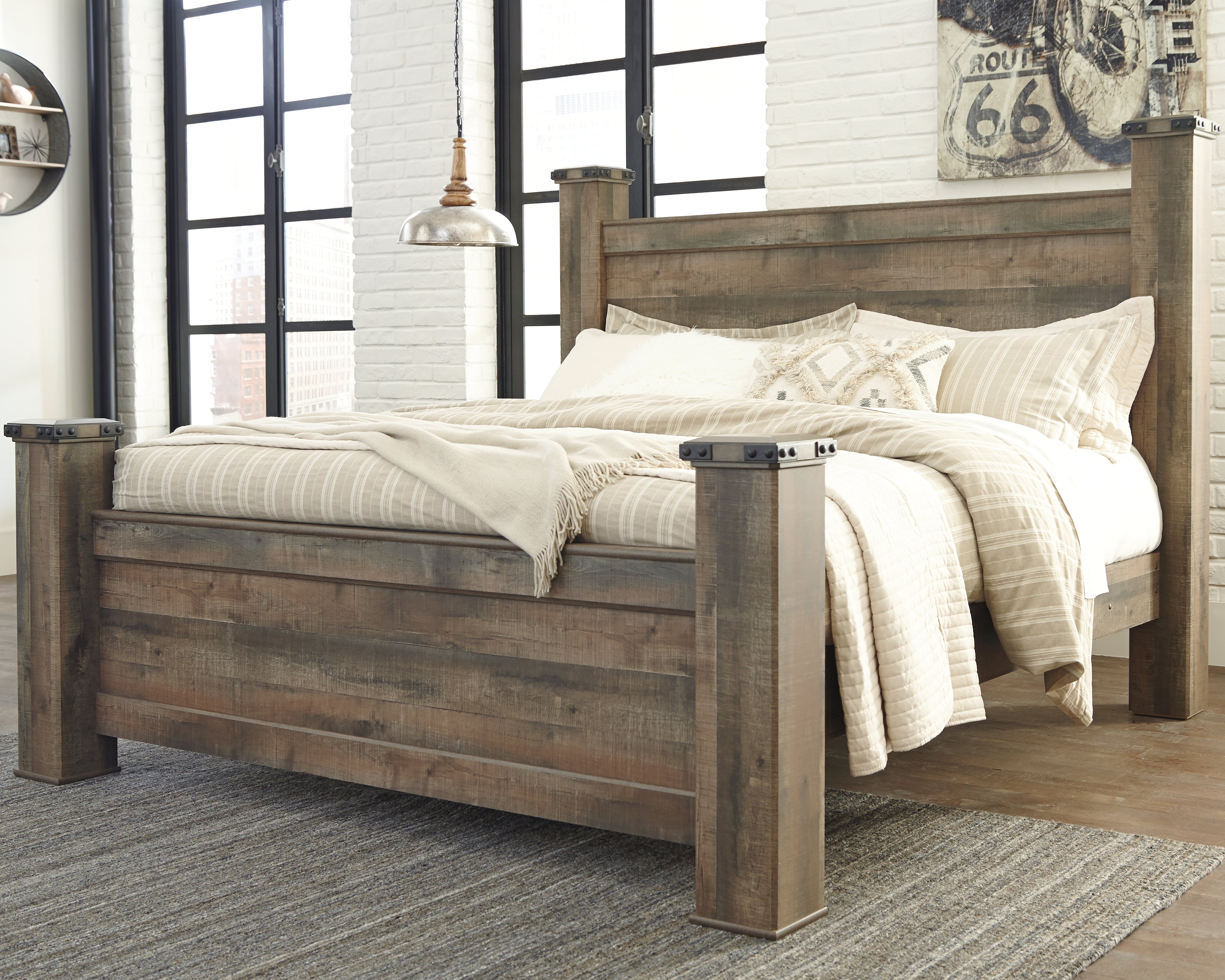 Tampa Furniture Outlet Lutz - Ashley Furniture - Trinell Bedroom - King Poster Bed / Brown - B446B45