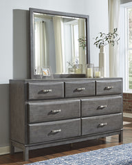 Tampa Furniture Outlet Lutz - Ashley Furniture - Caitbrook Bedroom - Dresser and Mirror / Gray - B476B1
