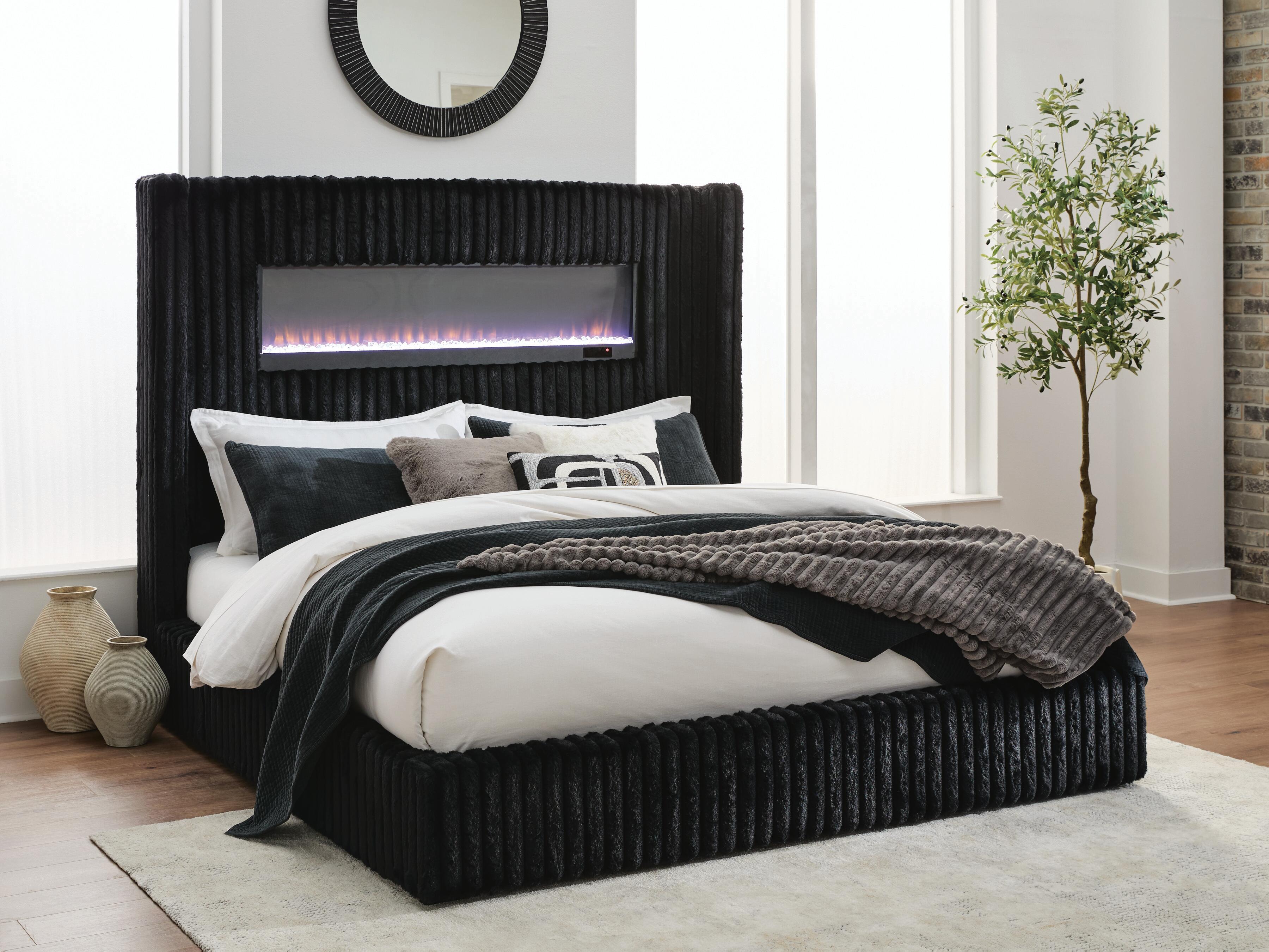 Tampa Furniture Outlet Lutz - Ashley Furniture - Tayleena Bedroom - Queen Upholstered Bed with Fireplace and Wireless Audio / Black - PCB620B1