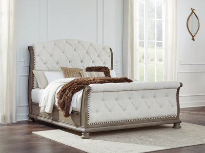 Tampa Furniture Outlet Lutz - Ashley Furniture - Ardenfield Bedroom - California King Upholstered Sleigh Bed / Light Brown - B944B5