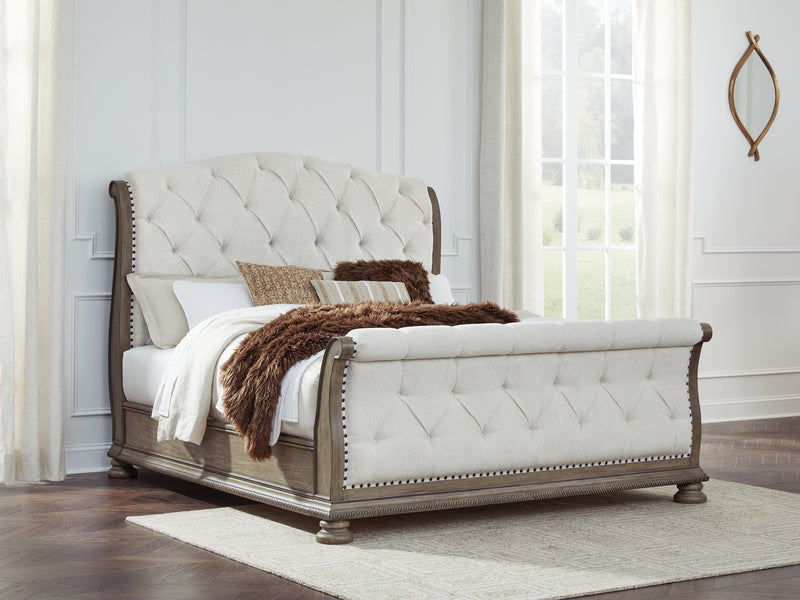 Tampa Furniture Outlet Lutz - Ashley Furniture - Ardenfield Bedroom - California King Upholstered Sleigh Bed / Light Brown - B944B5