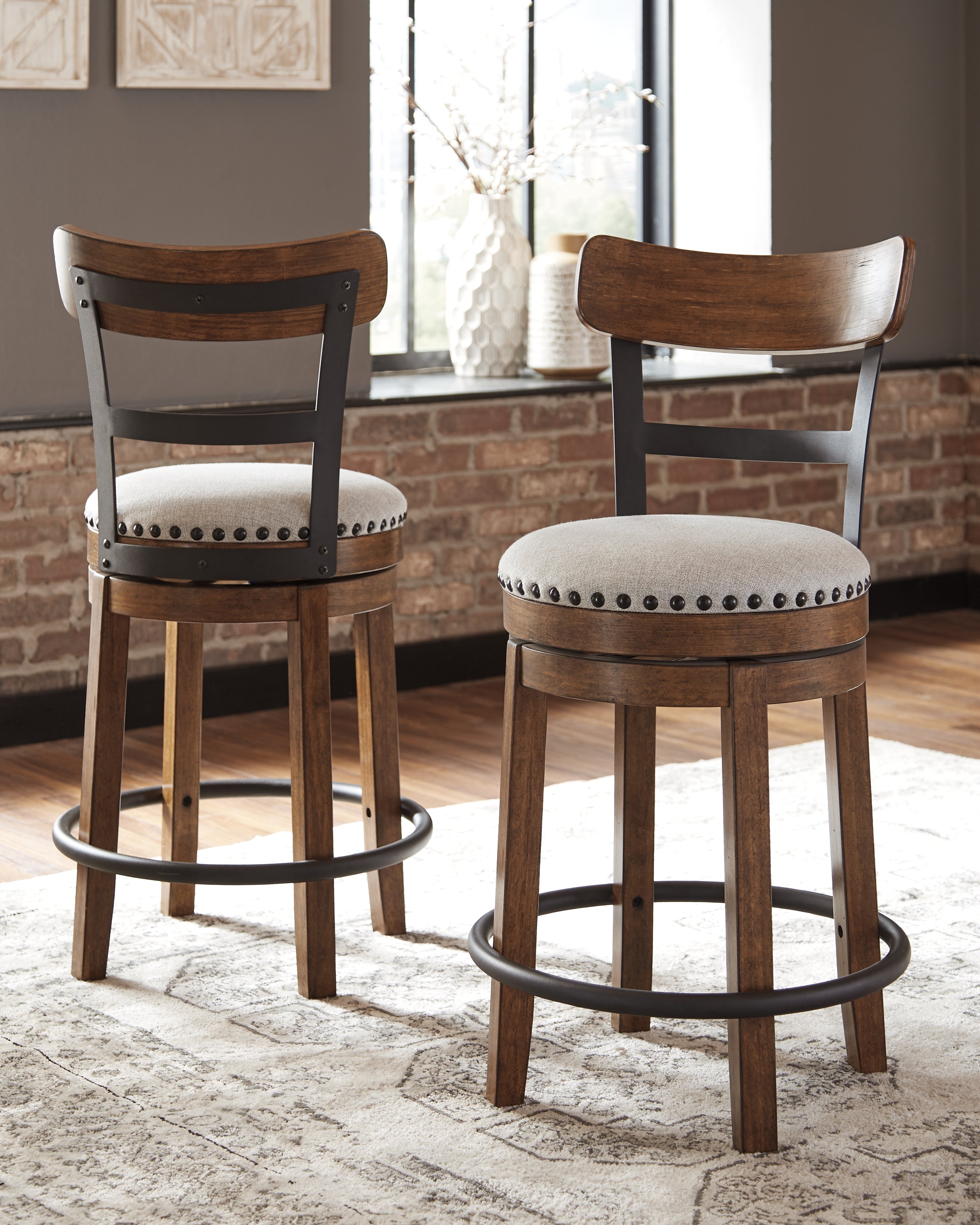 Tampa Furniture Outlet Lutz - Ashley Furniture - Valebeck Dining Room - UPH Swivel Barstool (1/CN) / Brown - D546-424