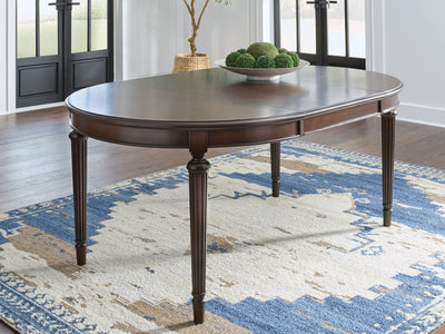 Tampa Furniture Outlet Lutz - Ashley Furniture - Lavinton Dining Room - Oval Dining Room EXT Table / Brown - D764-35