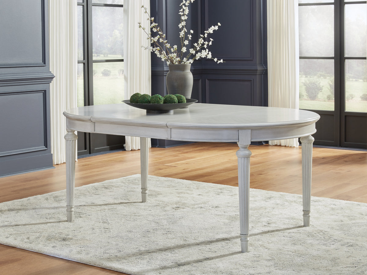 Tampa Furniture Outlet Lutz - Ashley Furniture - Montelaine Dining Room - Oval Dining Room EXT Table / Antique White - D795-35