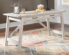 Tampa Furniture Outlet Lutz - Ashley Furniture - Carynhurst Office Desk - Home Office Large Leg Desk / Whitewash - H755-44
